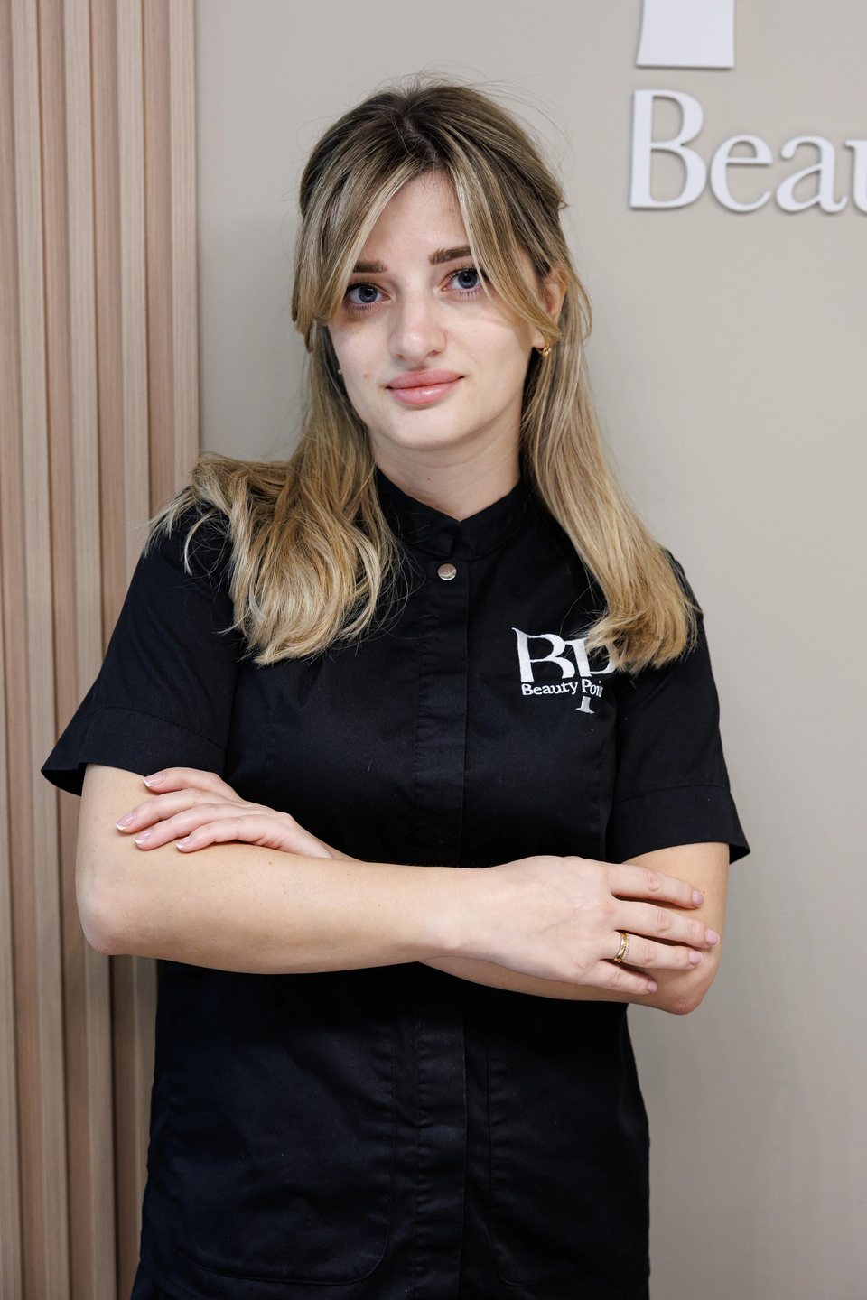 Beauty Point specialist in uniform, on-site portrait