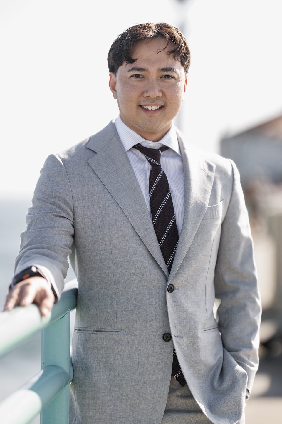Financial professional photographed on-site by the water in LA